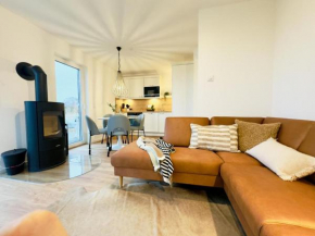 Haus Ostwind - Mit Infrarotsauna, Garten und Dachterrasse